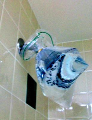 https://showers.waterpik.com/product-support/articles/images/how-to-clean-shower-head.jpg