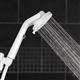 Side View of QBS-561MEB ShowerCare Pivoting Hand Held Shower Head Spraying Water